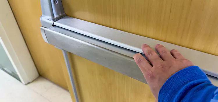 Installing a Push Bar on a Door Navarre
